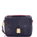 Pochette Metis Monogram Empreinte Leather