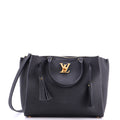 Louis Vuitton Lockmeto Handbag Leather